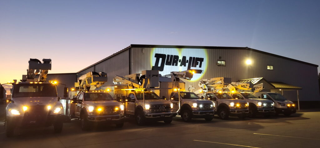 Lineup of bucket trucks